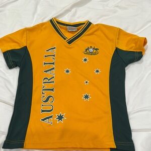Australia  shirt size 12 fits like boys 6/8